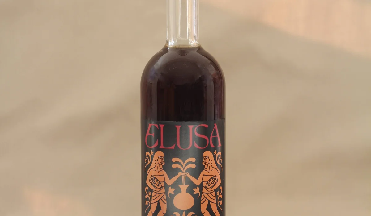 Elusa Coffee Liqueur bottle in a lifestyle setting