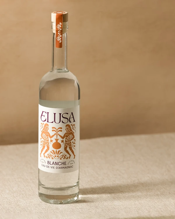 Elusa Blanche Armagnac bottle — clear spirit with copper and white label