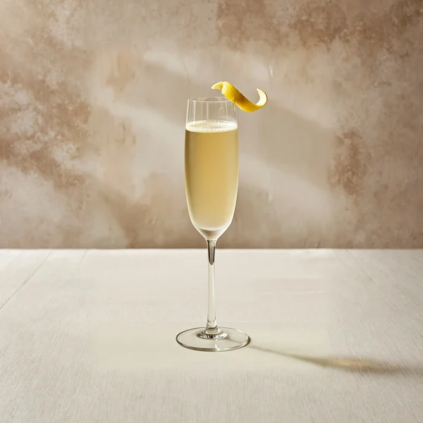French 75 cocktail made with Elusa Blanche Armagnac — champagne flute with lemon twist